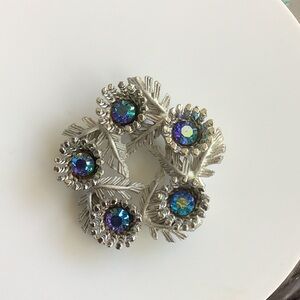Elegant Silver Brooch with Blue and Purple Accents
